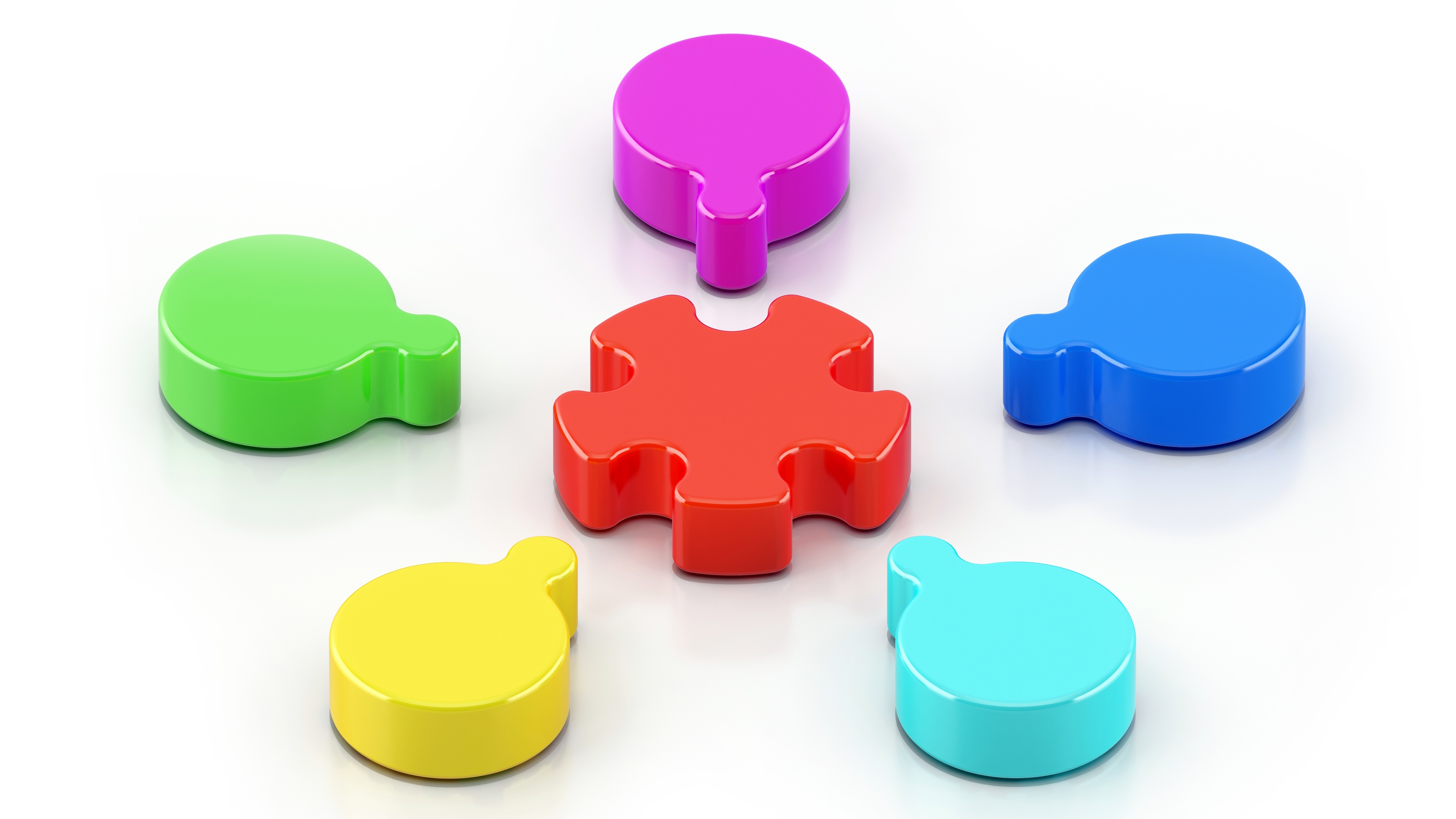 Five pieces of a puzzle arranged around a bigger piece in the center.