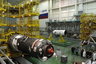 Engineers prepare the unmanned Progress 54 cargo ship for a Feb. 5, 2014 launch to the International Space Station. The spacecraft will launch atop a Soyuz rocket from Baikonur Cosmodrome in Kazakhstan.