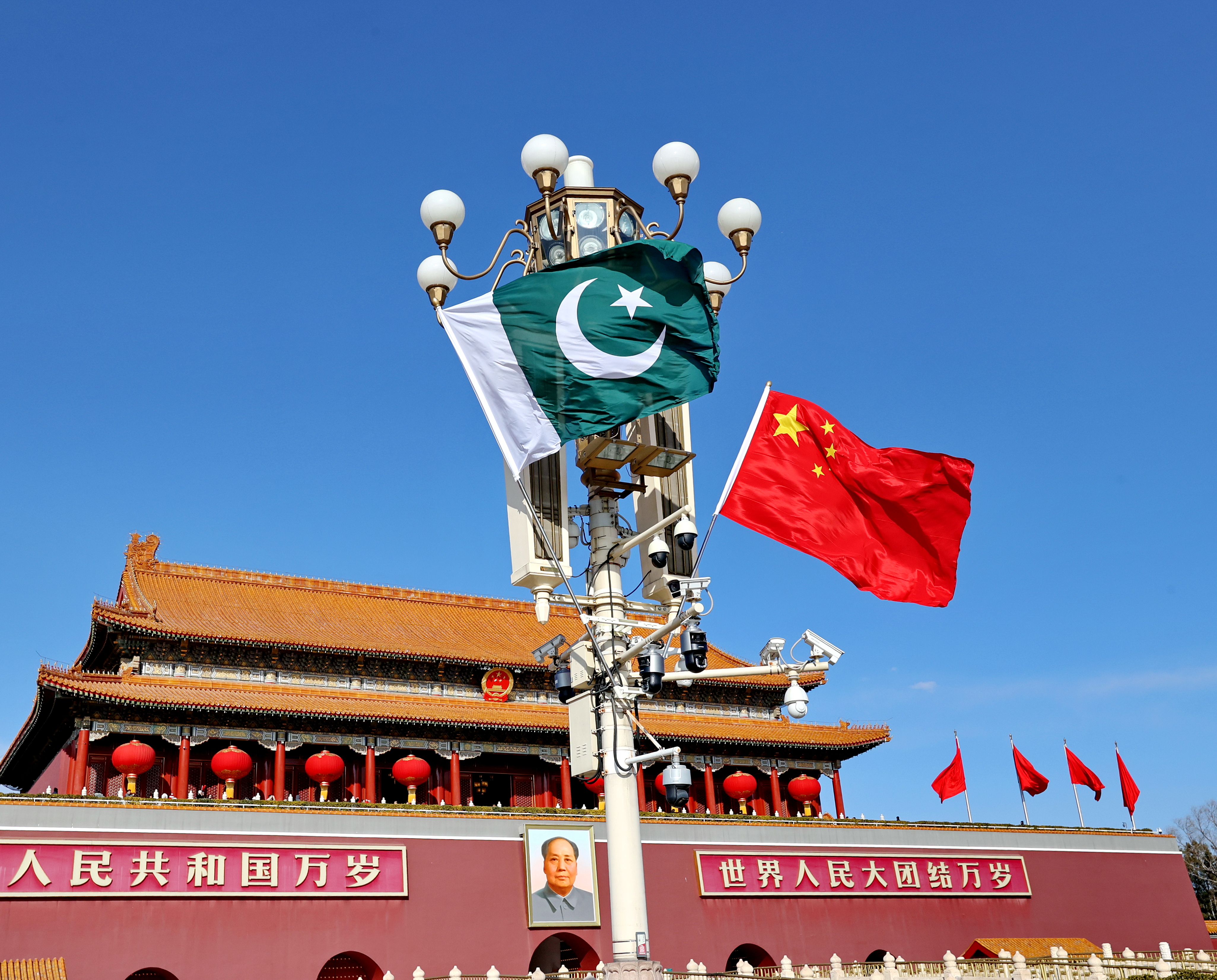 BEIJING, CHINA - FEBRUARY 04: The national flags of China and Pakistan flutter at Tian'anmen Square on February 4, 2025 in Beijing, China. Pakistani President Asif Ali Zardari started a five-day visit to China on February 4.