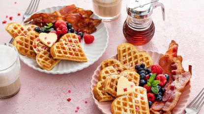Valentines day breakfast for two with heart-shaped waffles