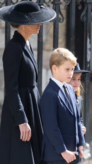 Catherine, Princess of Wales, Prince George of Wales and Princess Charlotte of Wales during the State Funeral of Queen Elizabeth II at Westminster Abbey on September 19, 2022 in London, England. Elizabeth Alexandra Mary Windsor was born in Bruton Street, Mayfair, London on 21 April 1926