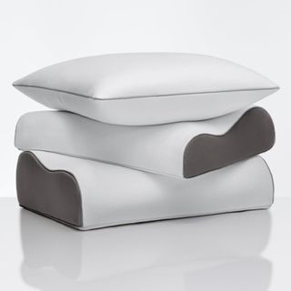 True Temp Pillows stacked on top of each other against a white background.