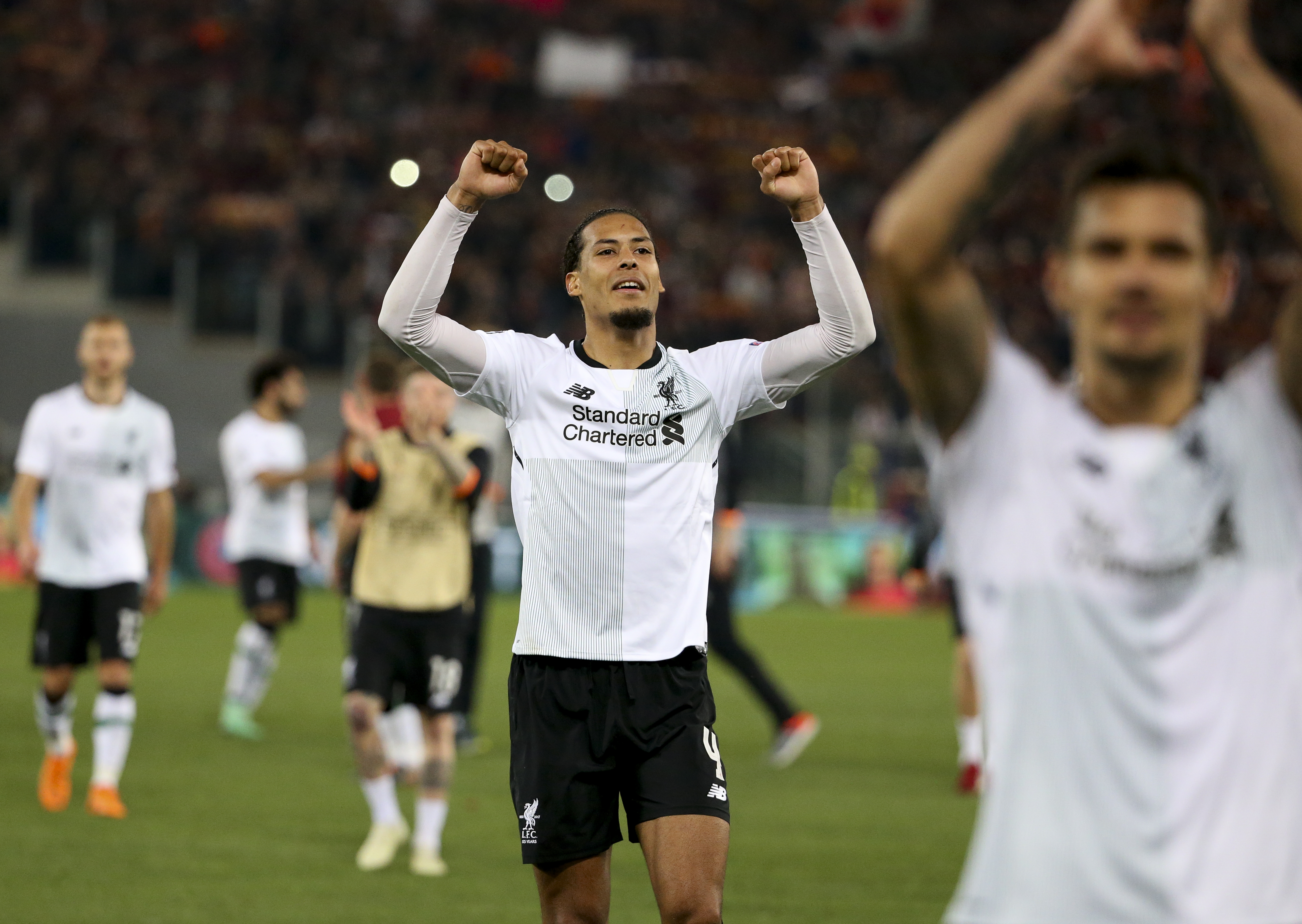 Virgil van Dijk celebrates after Liverpool's 7-6 aggregate win over Roma in the Champions League semi-finals in May 2018.