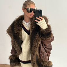 woman wearing oversize sunglasses outfit 2026