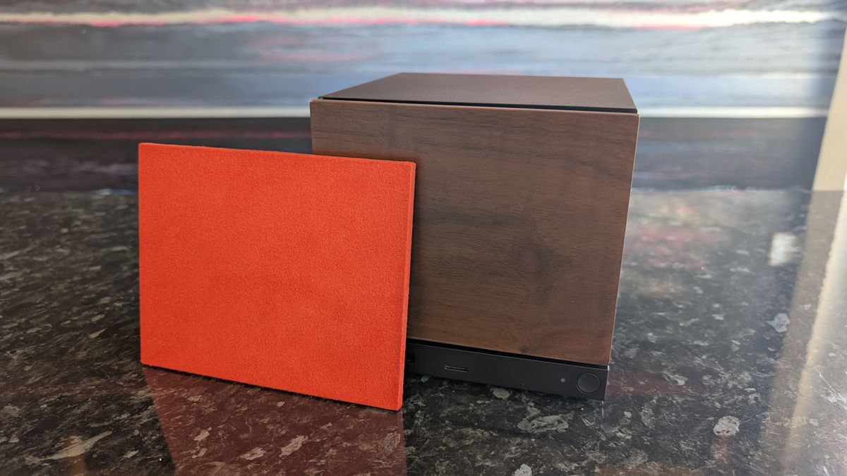 The Valve Steam Machine, pictured on a dark marble worktop.