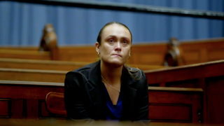 "Sophie", the defendant, looking pensive before the verdict in "The Jury: Murder Trial"