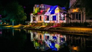 Christie technology was used to project digital artwork onto the bright white architecture of the small town of Alys Beach, FL for its annual Digital Graffiti Festival.