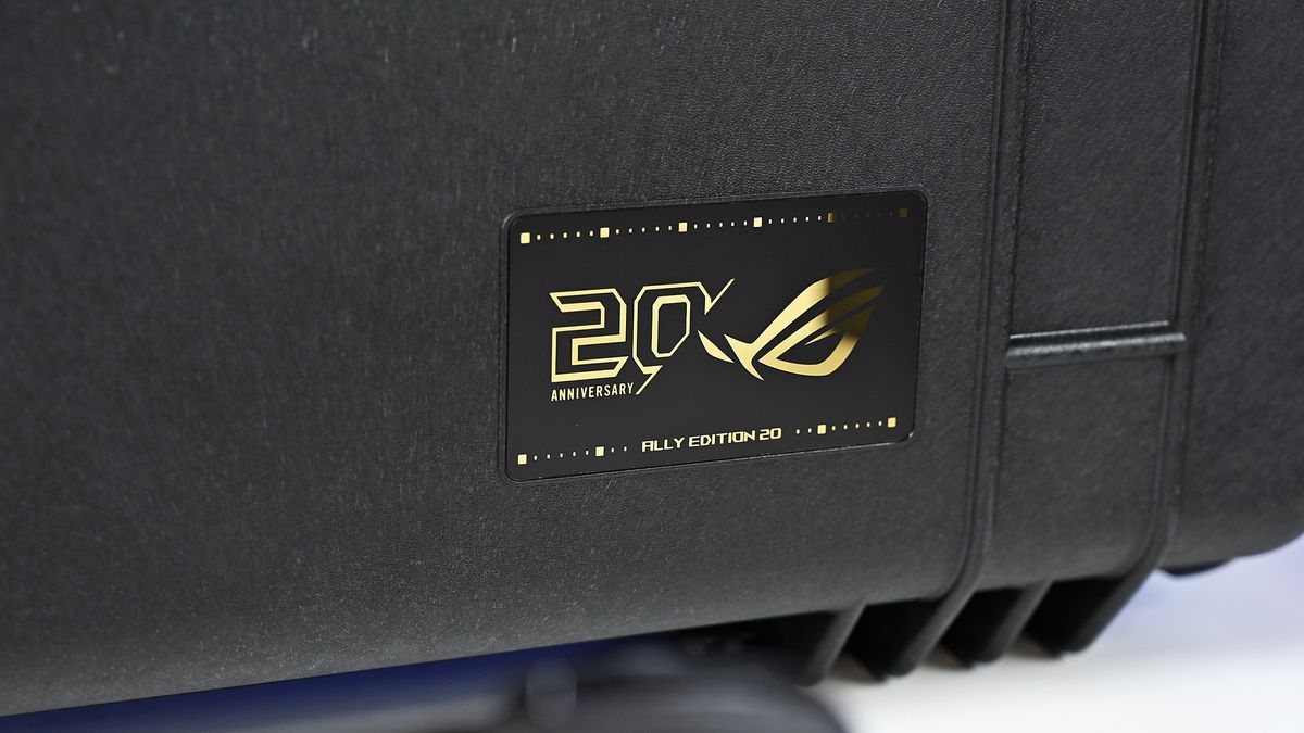 Close-up of the Pelican case's gold 20th Anniversary ROG badge, reading "20 Anniversary Ally Edition 20"