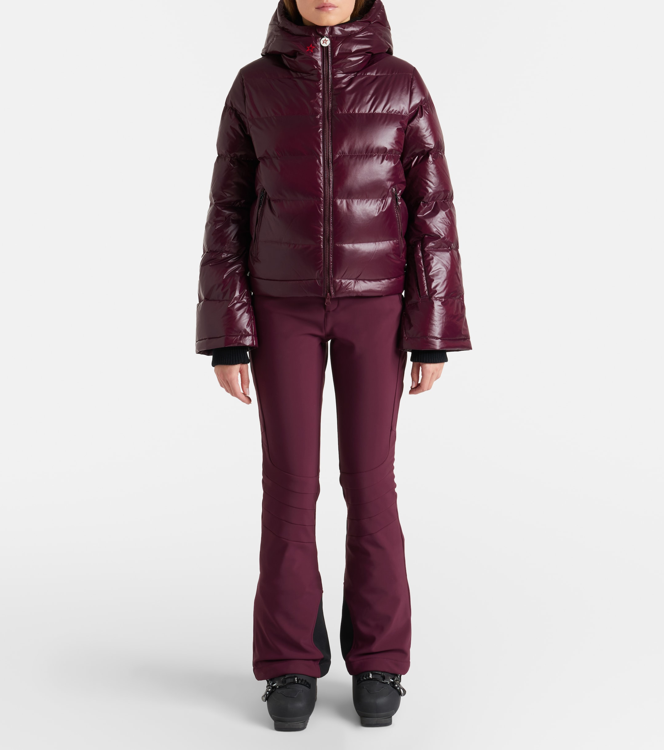 a model wearing a burgundy ski jacket from perfect moment