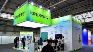 Visitors sit at the stand of Russian antivirus software development company Kaspersky Lab on the opening day of the MWC (Mobile World Congress) in Barcelona on February 28, 2022