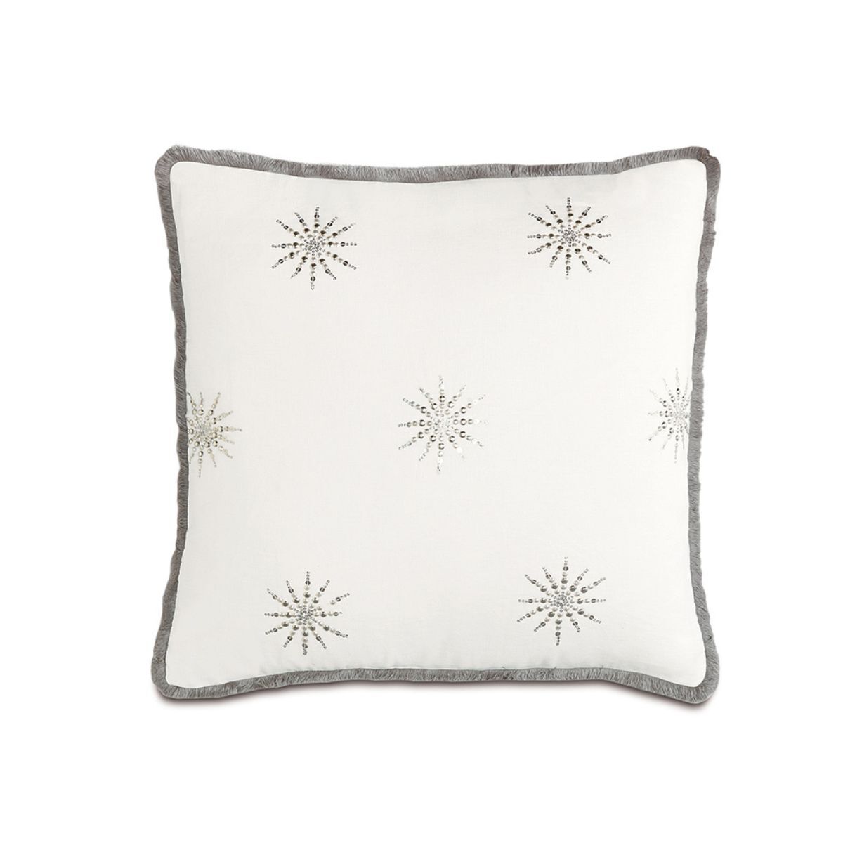 A silver pillow with star detailing