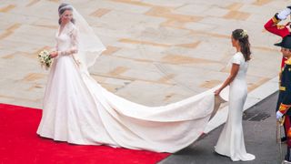 Kate Middleton arrives at Westminster Abbey on her wedding day and Pippa helps with her dress