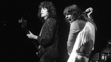 Ozzy Osbourne performs on stage on the 'Blizzard Of Ozz' tour, United Kingdom, September-October 1980. Ozzy Osbourne (vocals), Bob Daisley (bass). (Photo by Watal Asanuma/Shinko Music/Getty Images)