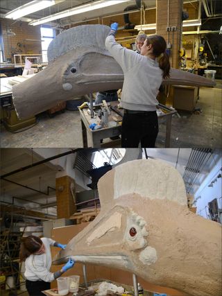 Museum preparators work on a full-size model of <i>Quetzalcoatlus northropi</i>.