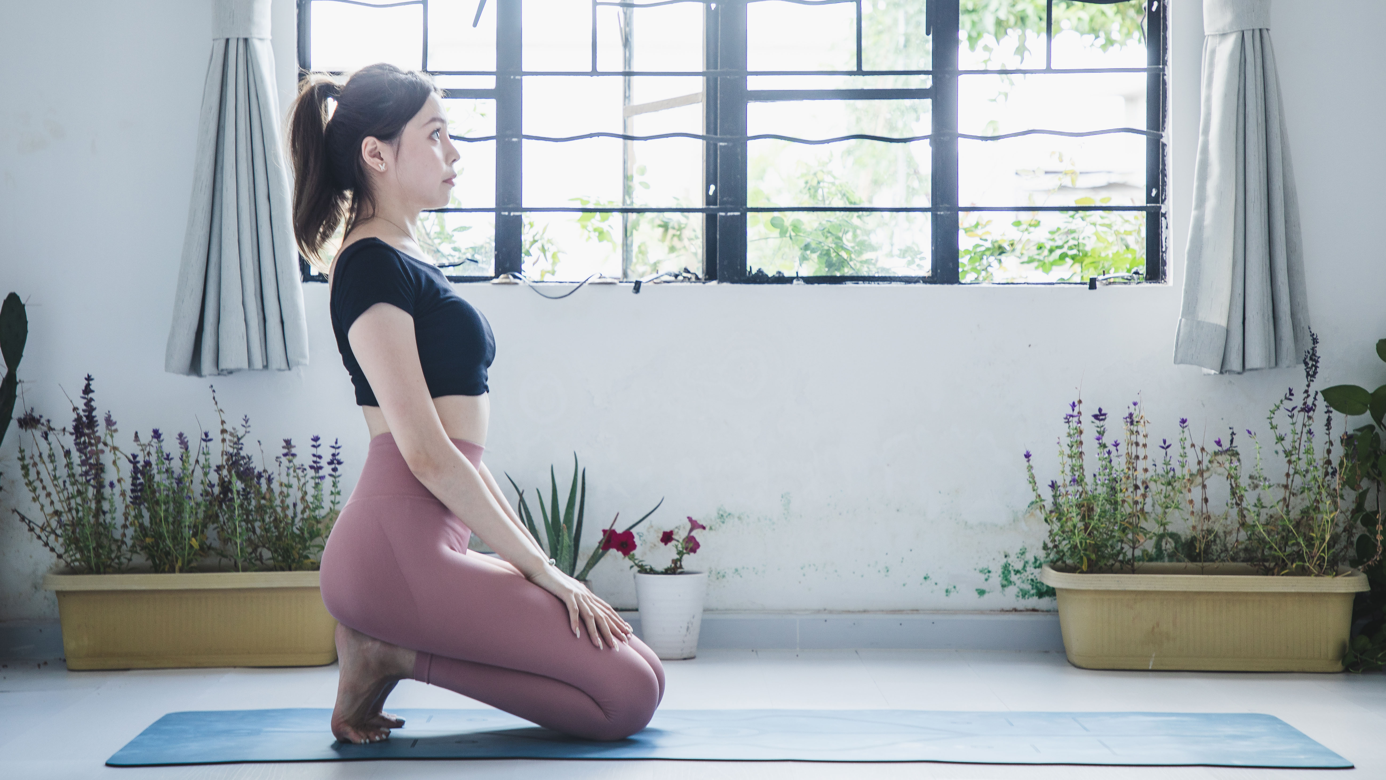 woman doing toe squat