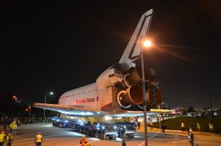 Endeavour is seen on top the overland transporter turning onto Westchester Parkway in Los Angeles on Oct. 12, 2012.