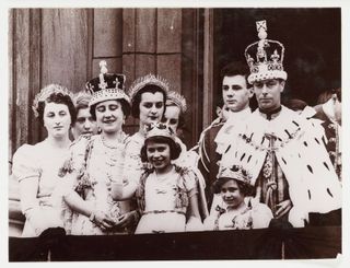 King George VI, Queen Elizabeth (later The Queen Mother), Princess Elizabeth, and Princess Margaret in their Coronation robes, 1937
