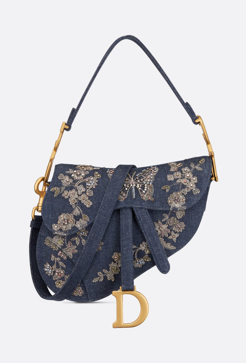 An image of the Dior saddle bag, one of the most popular designer handbags of all time.