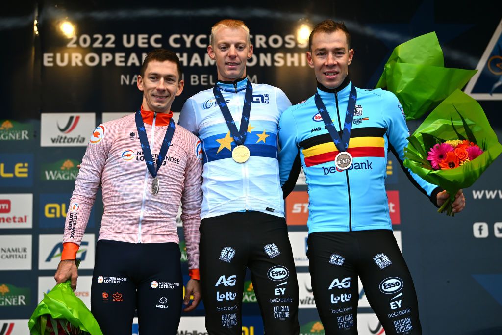 NAMUR BELGIUM NOVEMBER 06 LR Silver medalist Lars Van Der Haar of The Netherlands gold medalist Michael Vanthourenhout of Belgium and bronze medalist Laurens Sweeck of Belgium pose on the podium during the medal ceremony after the 20th UEC European Cyclocross Championships 2022 Mens Elite EuroCross22 on November 06 2022 in Namur Belgium Photo by Luc ClaessenGetty Images