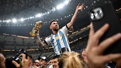 FIFA World Cup 2022 &ndash; Lionel Messi holds World Cup trophy after Argentina's win in Qatar
