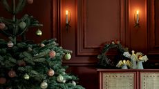 warm red terracotta wall with chrismas tree and side unit