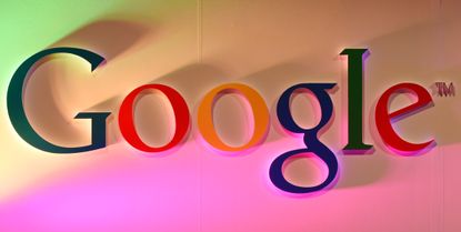 The Google logo looms
