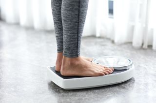 Feet on weighing scales