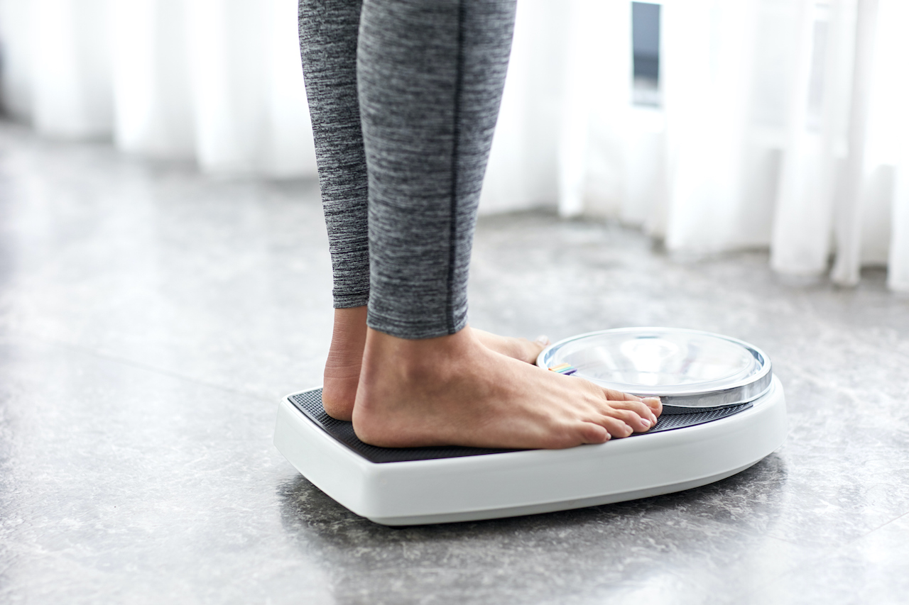 Feet on weighing scales