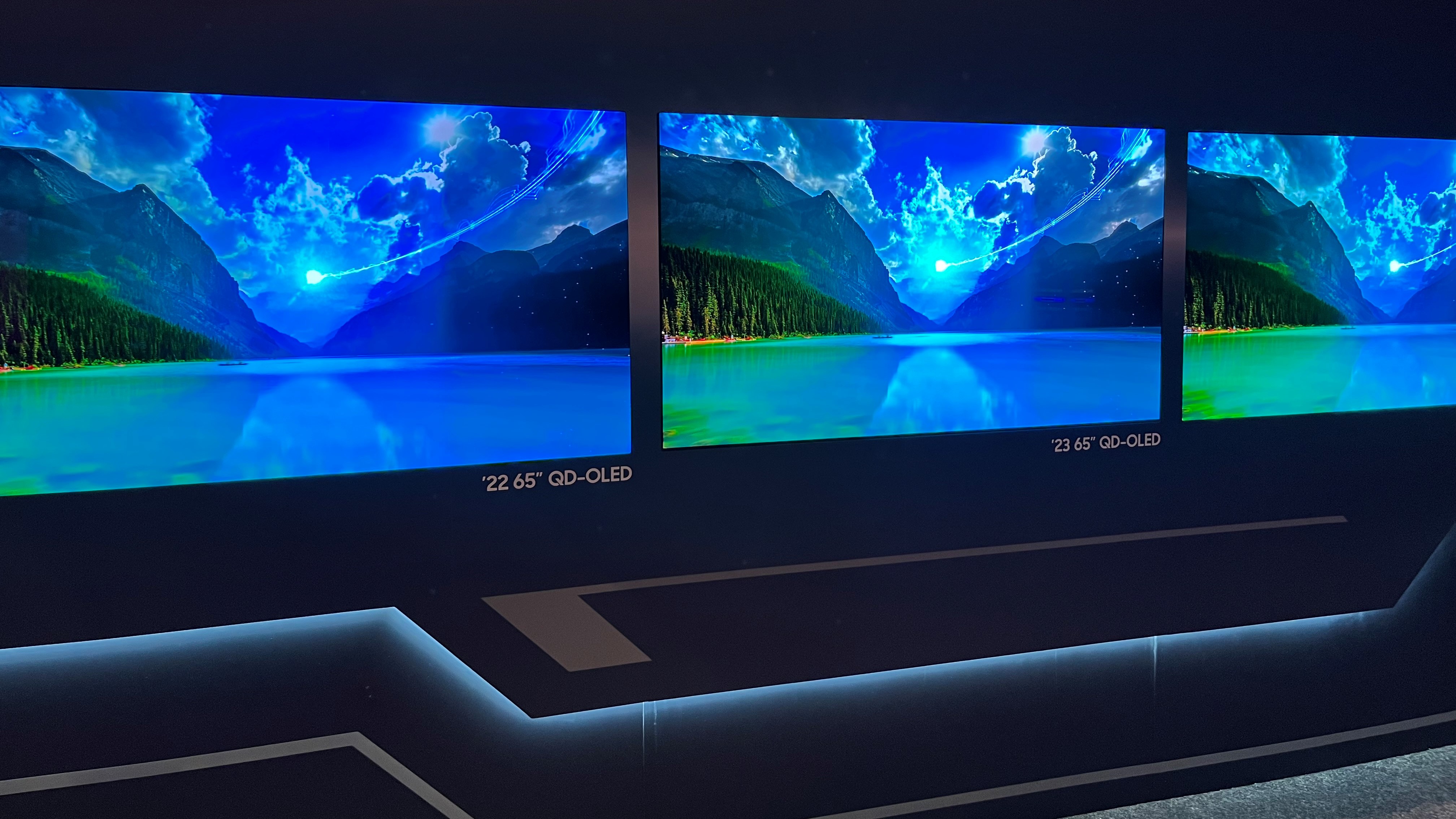 Samsung S95C OLED TV with older models on the left and right