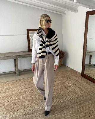 Linda Tol 30 Striped Pieces to Buy Now and Wear Forever Over The Shoulder Sweater Trousers European Outfit Idea