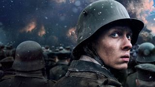 A promotional image of a German soldier looking over his shoulder in Netflix's All Quiet on the Western Front