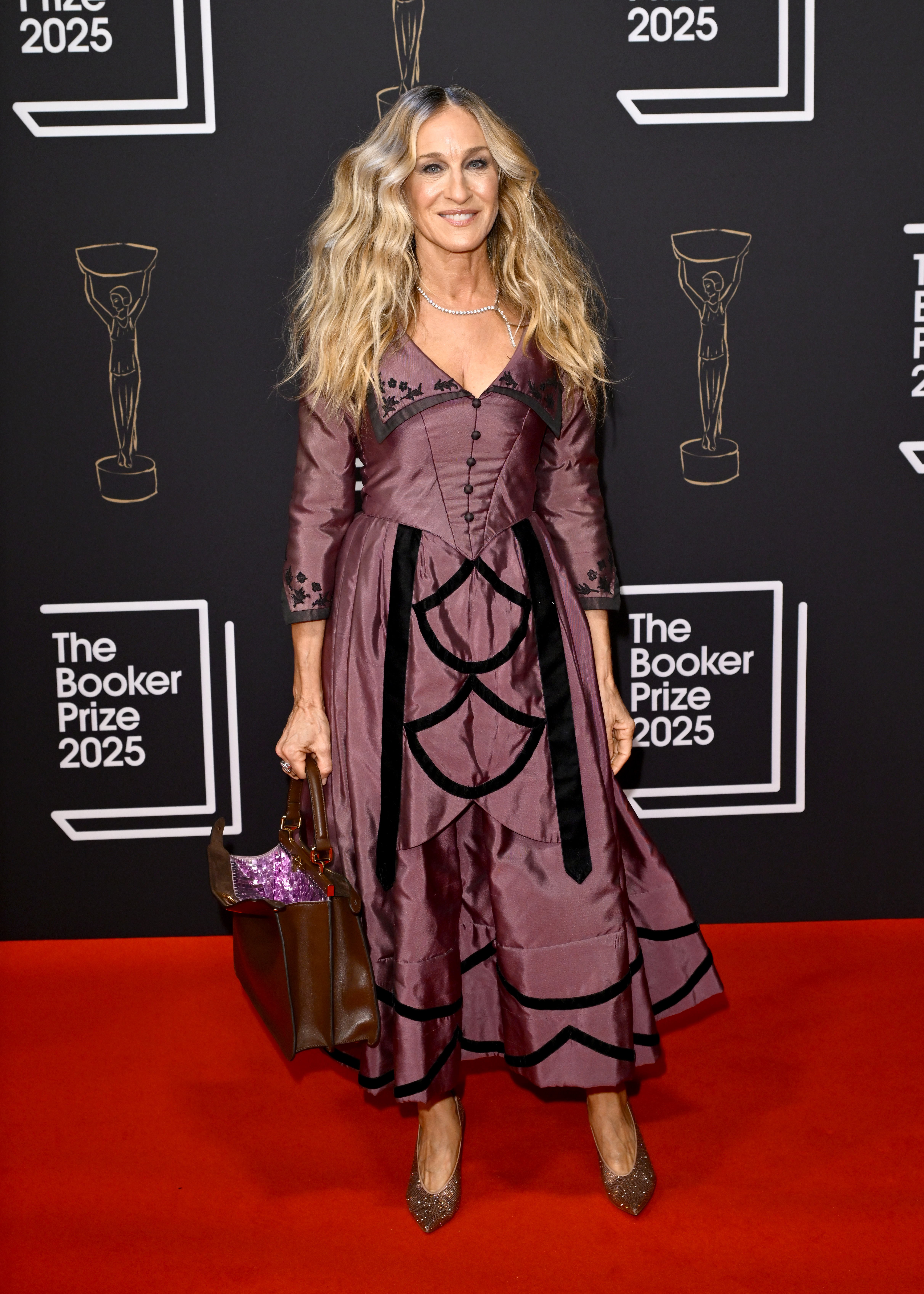 Sarah Jessica Parker attended the Booker Prize 2025 event in a corseted dress and a brand-new Fendi peekaboo bag