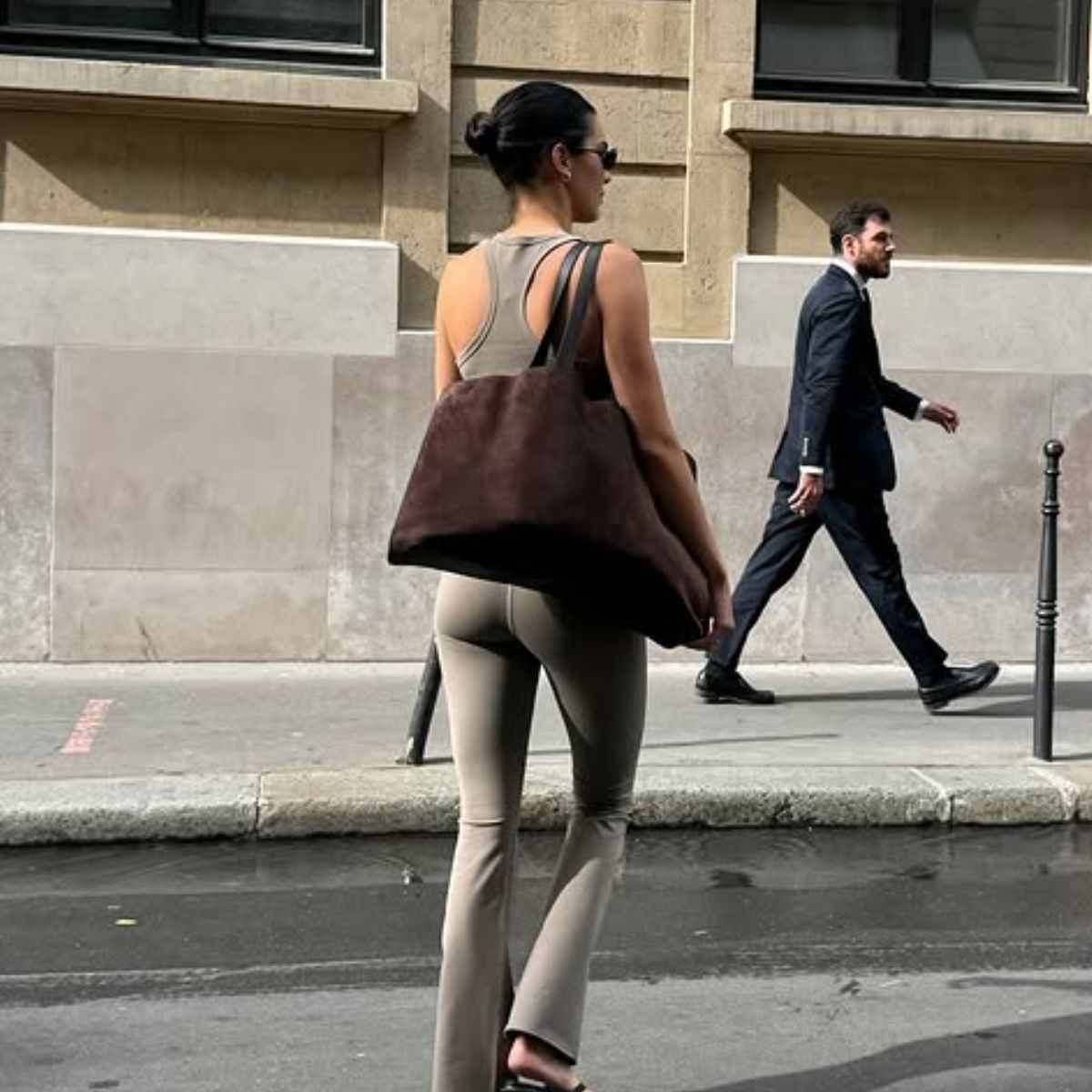 An image of Kendall Jenner showcasing what shoes to wear with bootcut leggings.