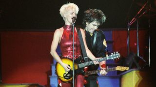 LONDON, UNITED KINGDOM - OCTOBER 19: Marie Fredriksson and Per Gessle of Roxette perform on stage on the 'Join The Joyride' tour at Wembley Arena on October 19th, 1991 in London, England. (Photo by Pete Still/Redferns)