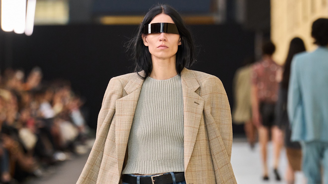 S/S 26 Margiela model wears washed out jeans. 