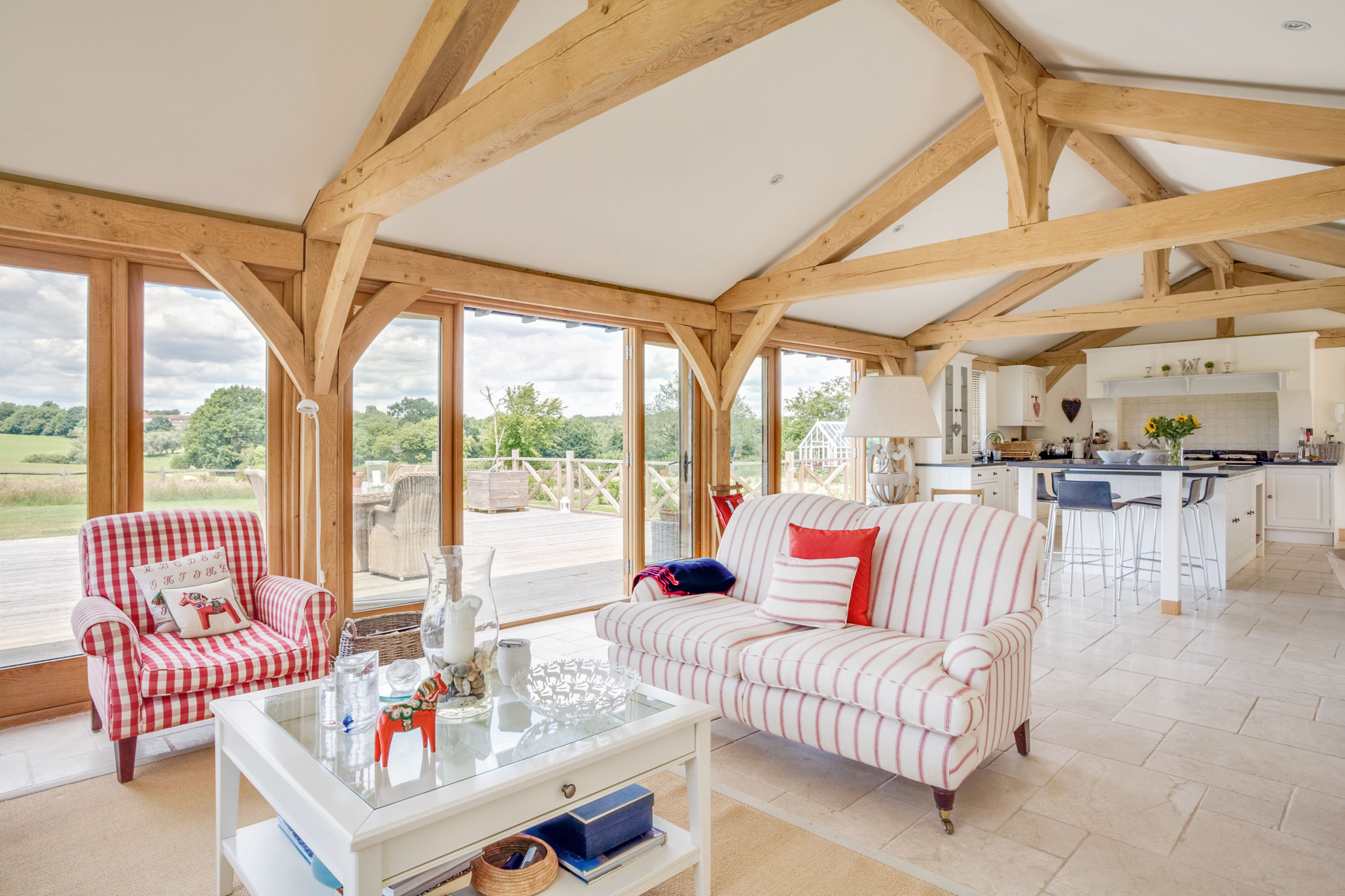 An oak-frame extension creates a blissful setting for indoor-outdoor living, with bi-fold doors really opening up the space.