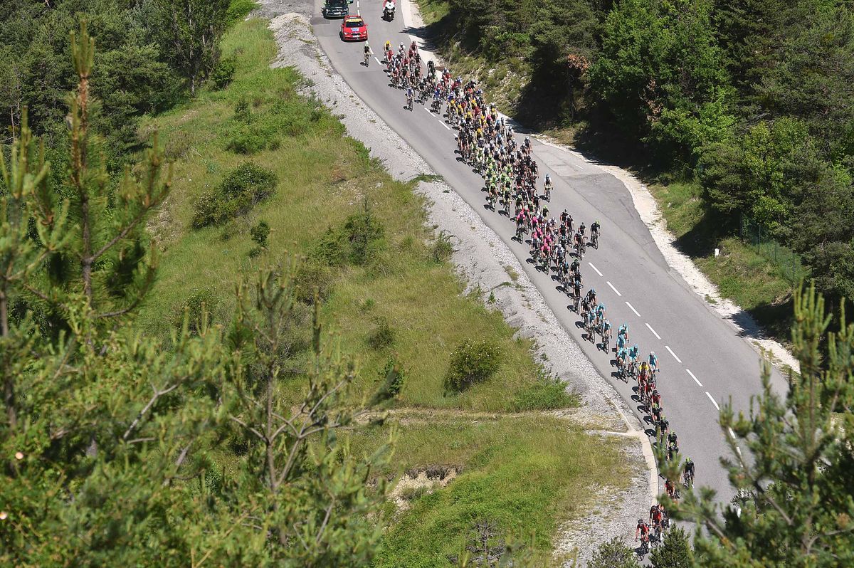 Riders begin to struggle as the road goes up