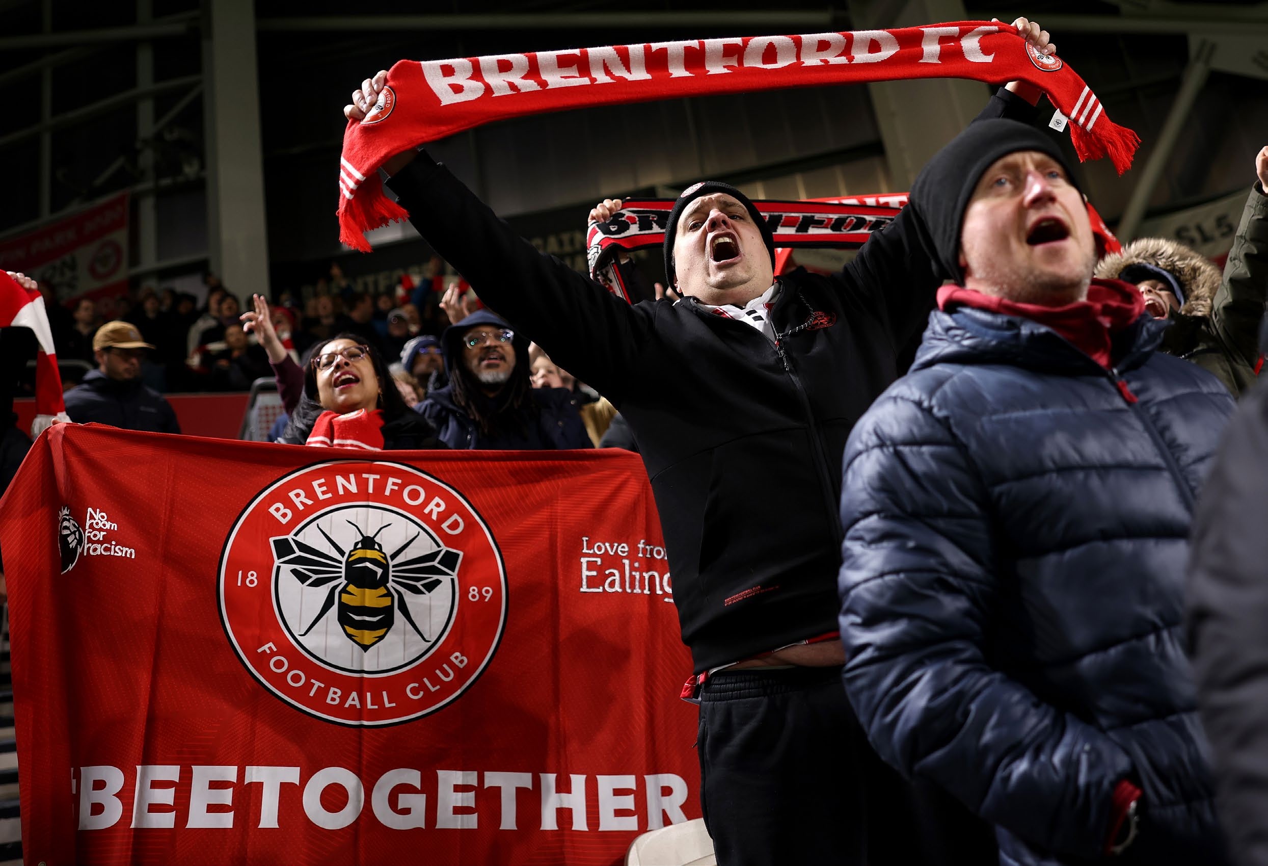 Brentford fans cheering.