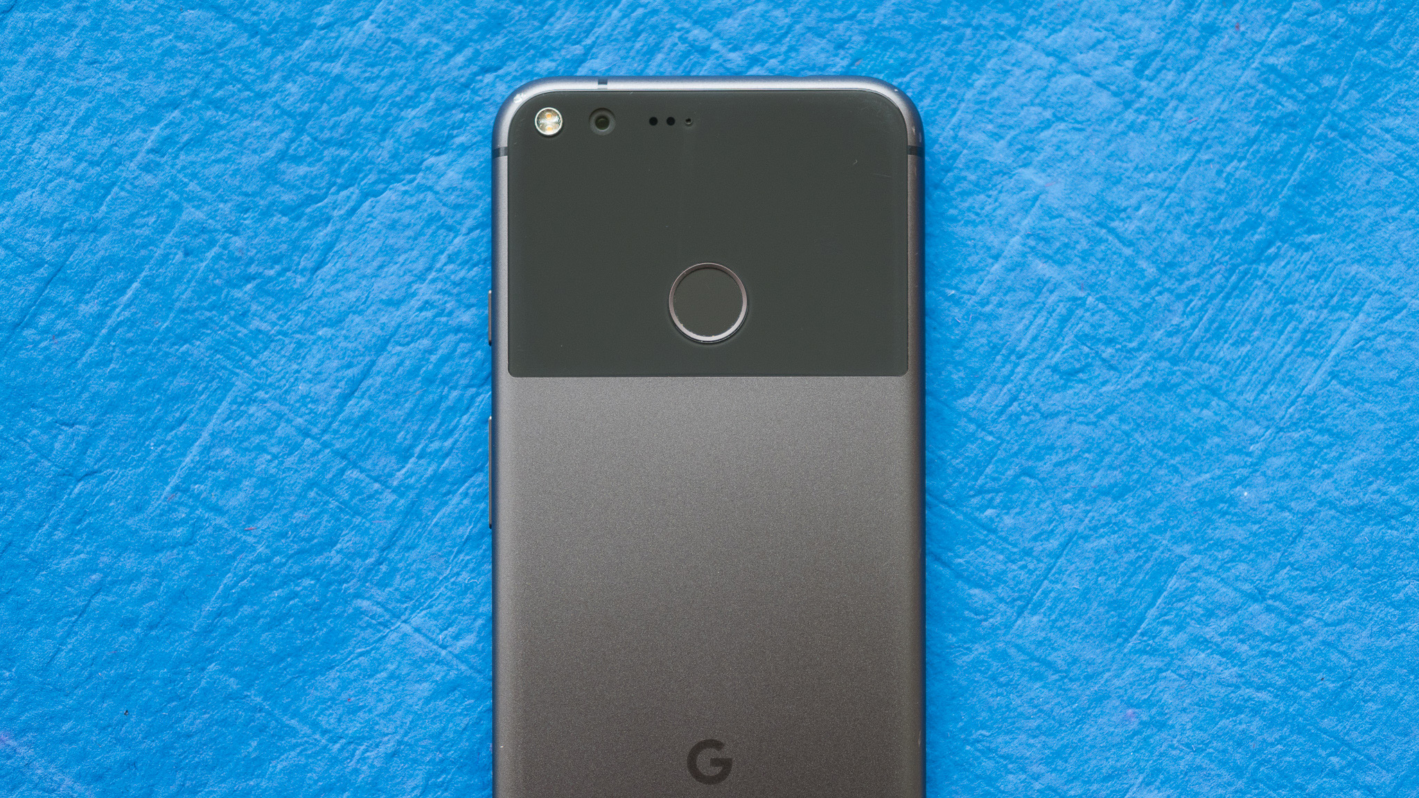 Google Pixel XL back against blue background