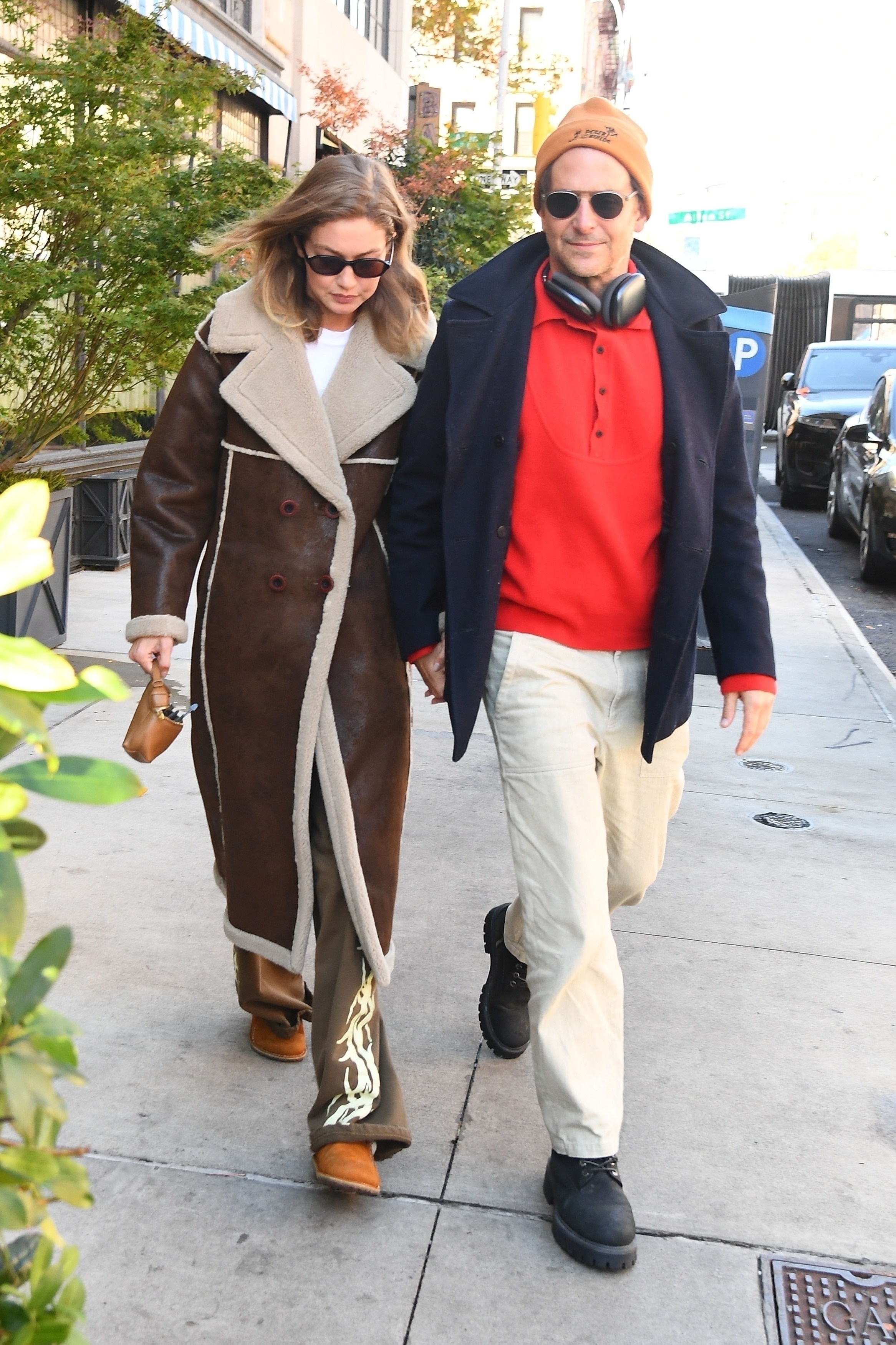 Gigi Hadid and Bradley Cooper wear coats
