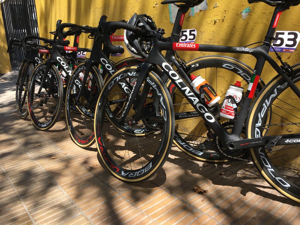 The matt black UAE Team Emirates Colnago await the riders