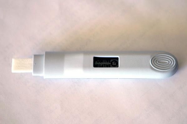 A clearly legible digital 'POSITIVE' or 'NEGATIVE' readout indicates guilt or innocence.