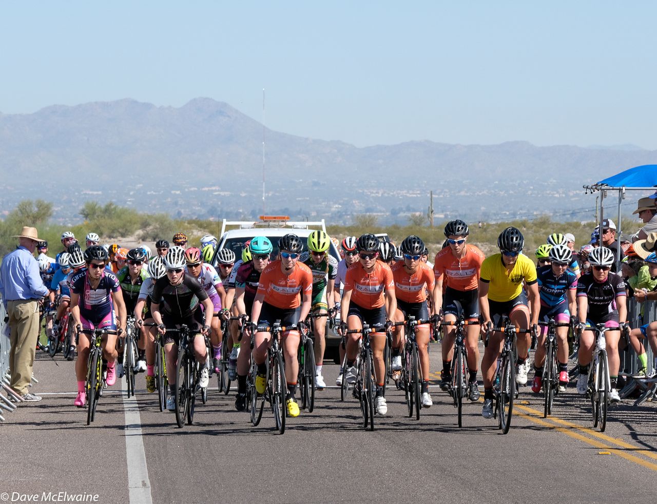 The Pro Women start onto the circuit with the Catalina Mountains in the background