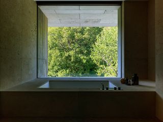 Master bathroom, with with a view of the surrounding greenery