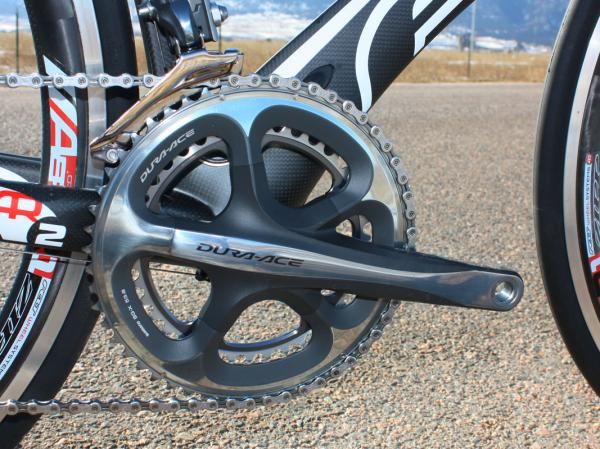 The Shimano Dura-Ace crank rotates on a set of standard thread-in cups