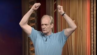 Colin styling his pretend hair on Whose Line Is It Anyway?