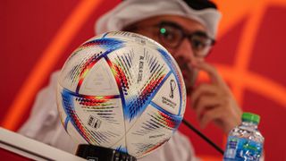 Al-Rihla World Cup football with arab gentleman in the background