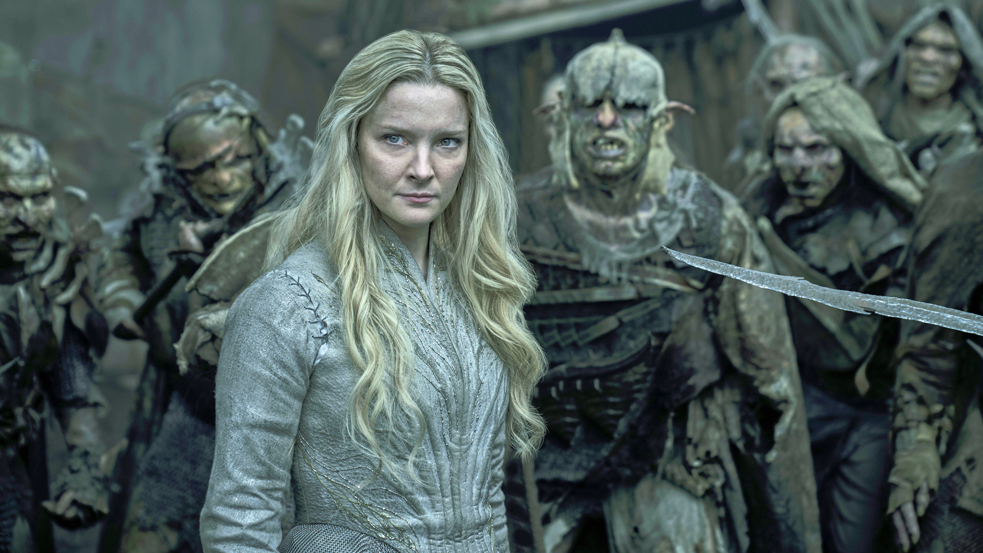 Galadriel looking annoyed as she's surrounded by orcs in The Rings of Power season 2 episode 6