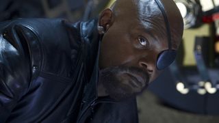 Samuel L. Jackson as Nick Fury, laying flat in Marvel's The Avengers