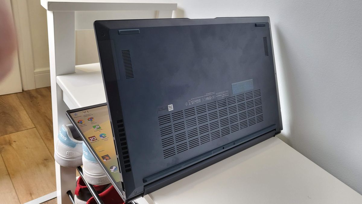Asus Zenbook OLED 15 (2023) on a shelf